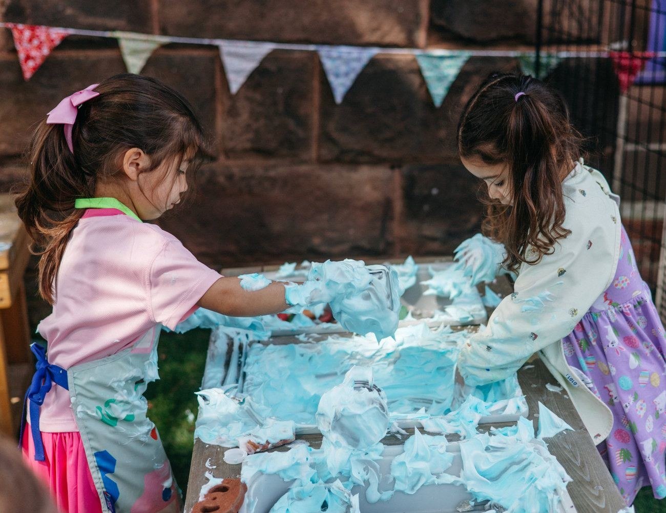 A child at the sensory table at The Spanish Playhouse